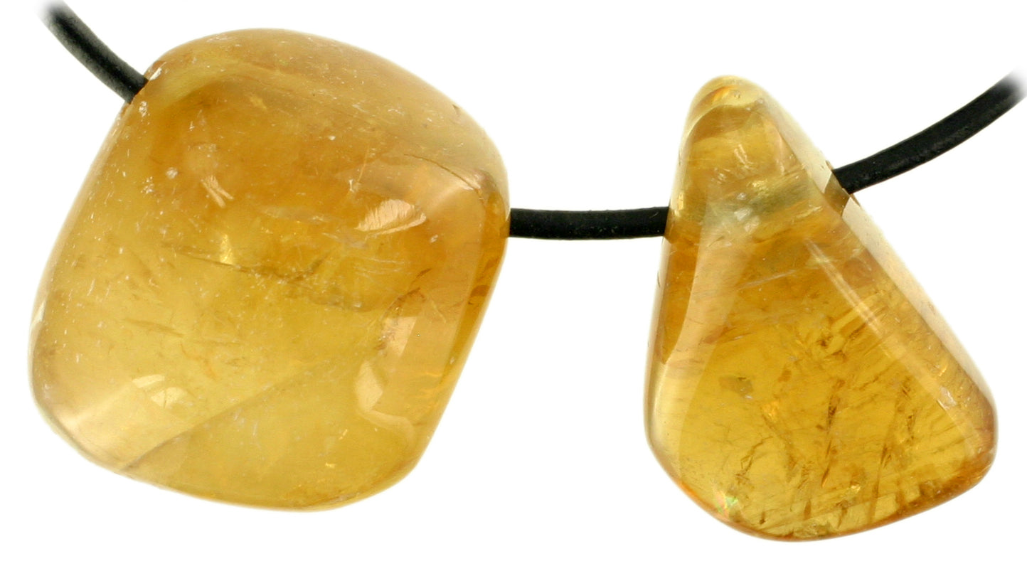 Honigcalcit Trommelstein durchbohrt