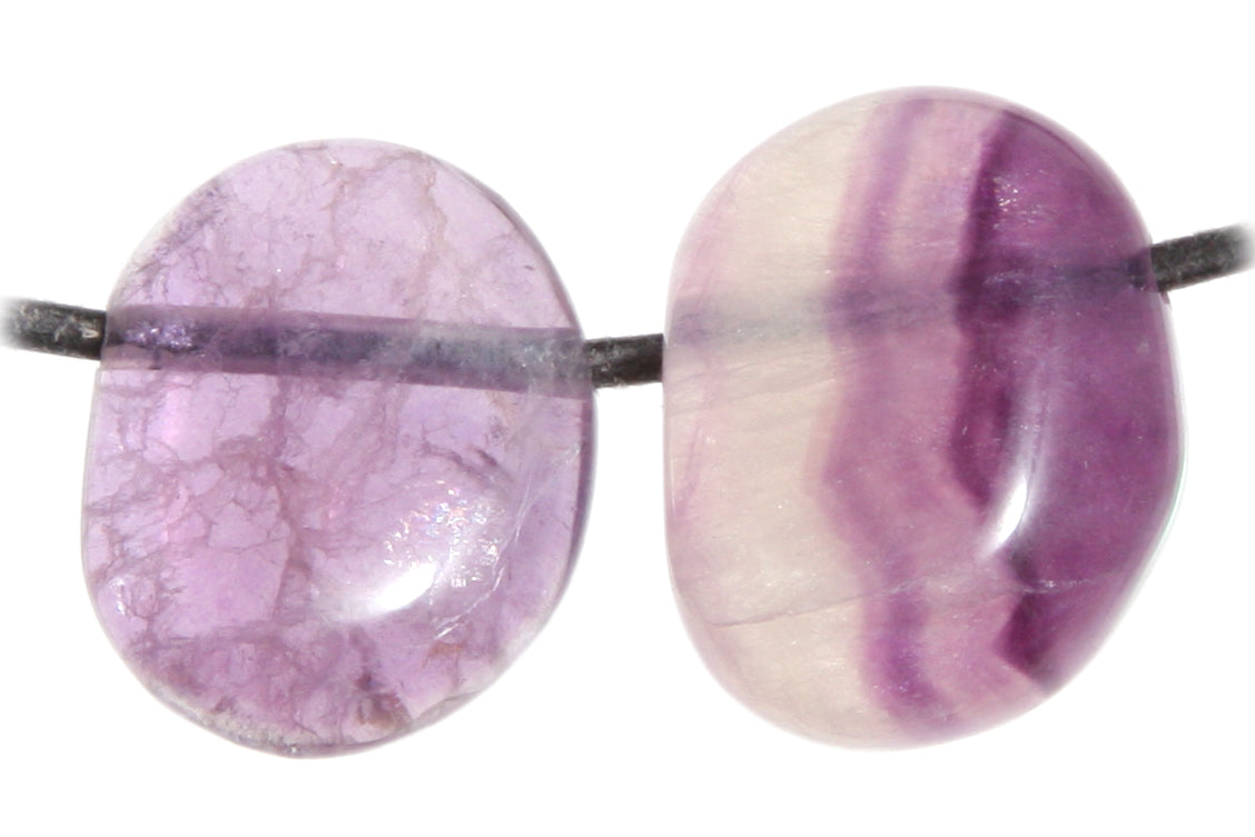 Fluorit violett Trommelstein durchbohrt